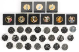 Thirty two Elizabeth II fifty pence pieces, various designs comprising Beatrix Potter, The Snowman