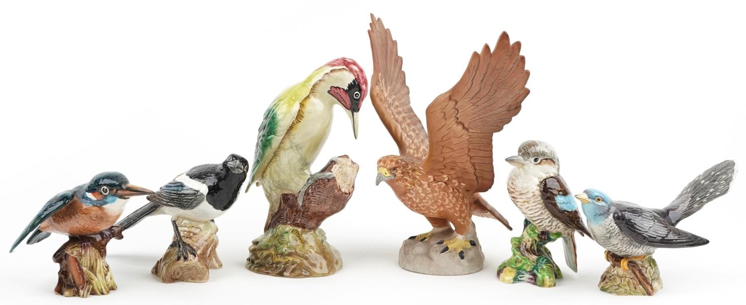 Six Beswick birds including Golden Eagle and Woodpecker, the largest 26cm high