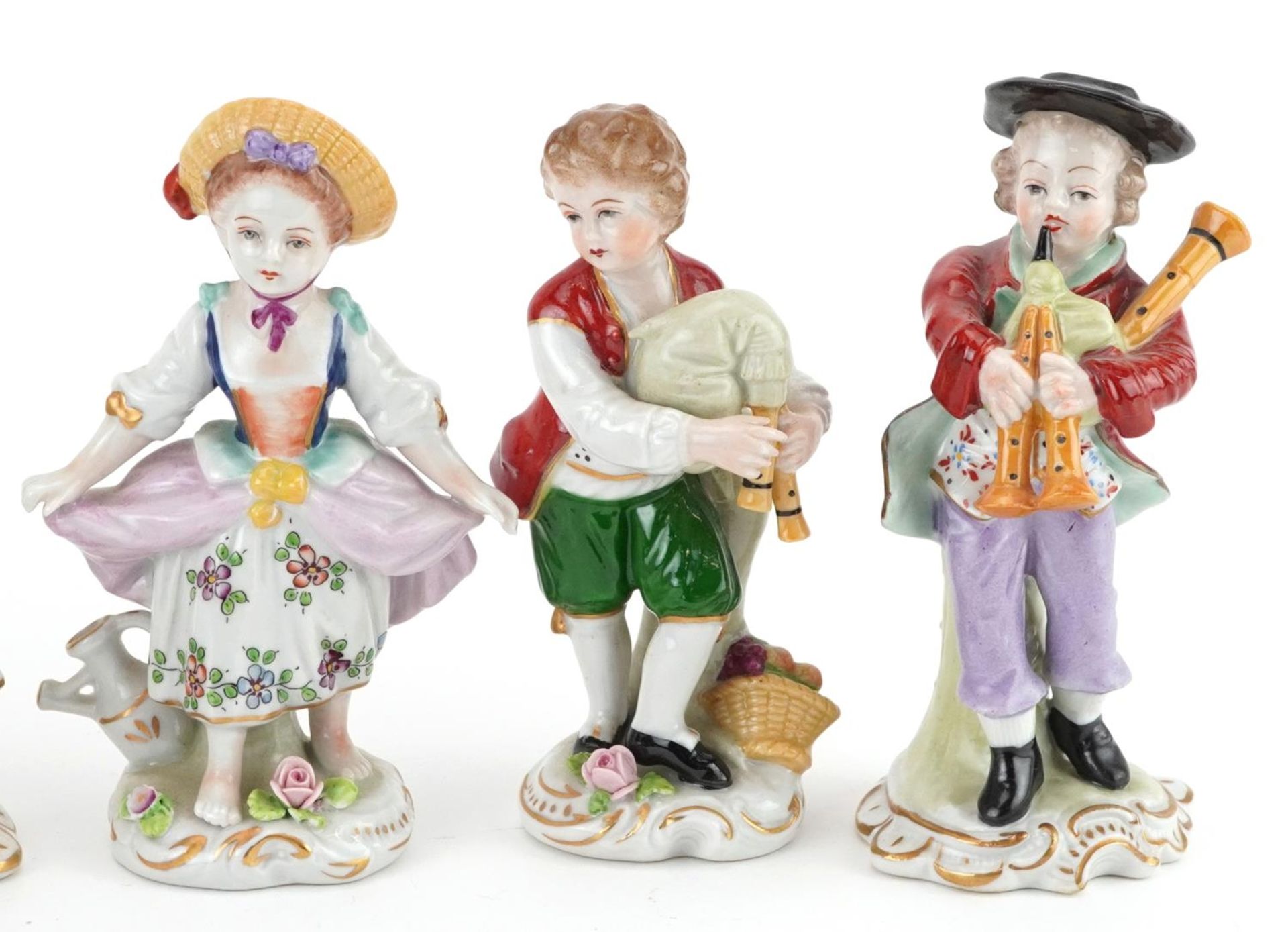 German porcelain comprising four Dresden figurines and a lace figurine in the form of a female on - Image 3 of 5