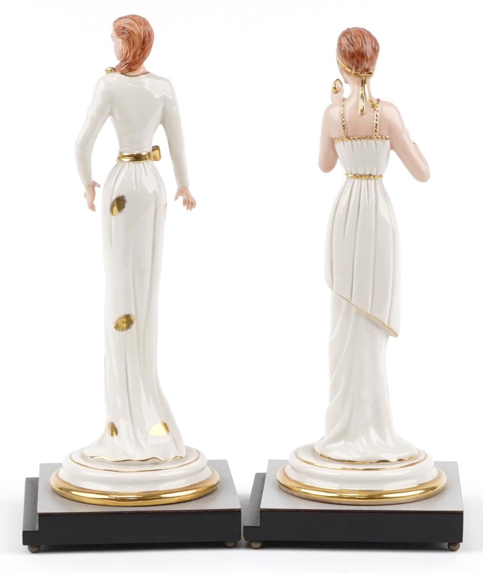 Pair of Italian porcelain figurines of females raised on silvered and ebonised stepped square bases, - Image 2 of 3