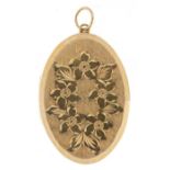 9ct gold floral engraved locket, 3.5cm high, 8.0g