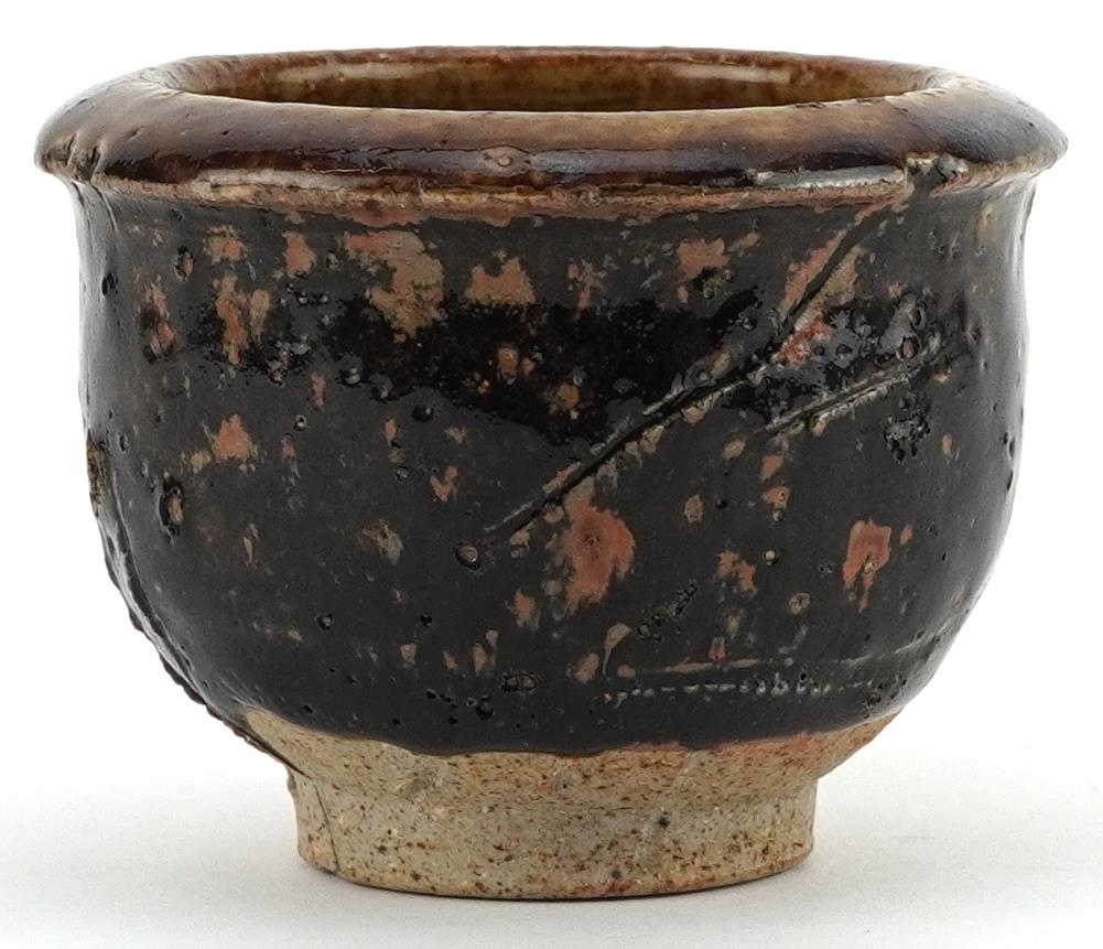 Japanese studio pottery Yunomi tea bowl having a purply brown glaze, 8.5cm in diameter