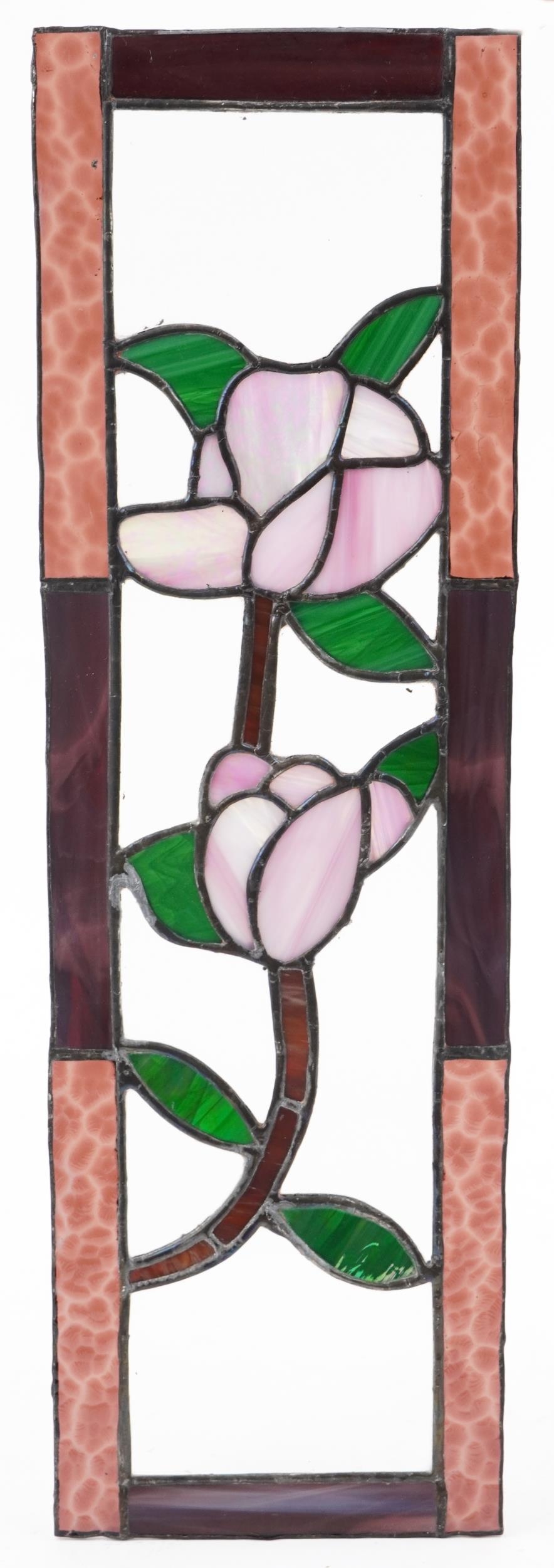 Four leaded stained glass window panels including a pair, each decorated with flowers, the largest - Image 5 of 9