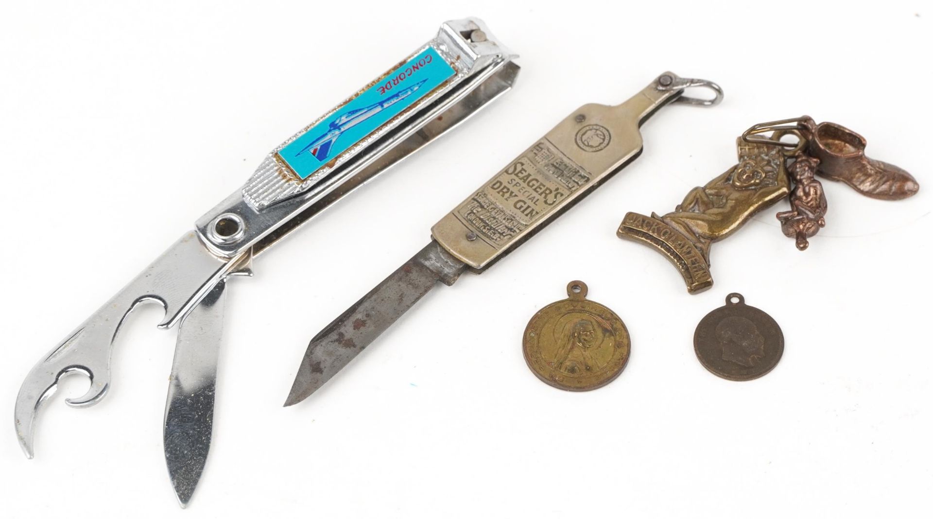 Sundry items including an aviation interest nail clippers advertising Concorde and a folding