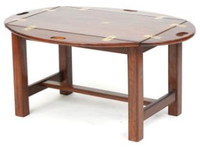 Mahogany butler's tray table with folding sides and brass foliate inlay, 56cm H x 74cm W x 50cm D as