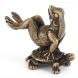 Comical bronze of a acrobatic frog on tortoise, 3.5cm high