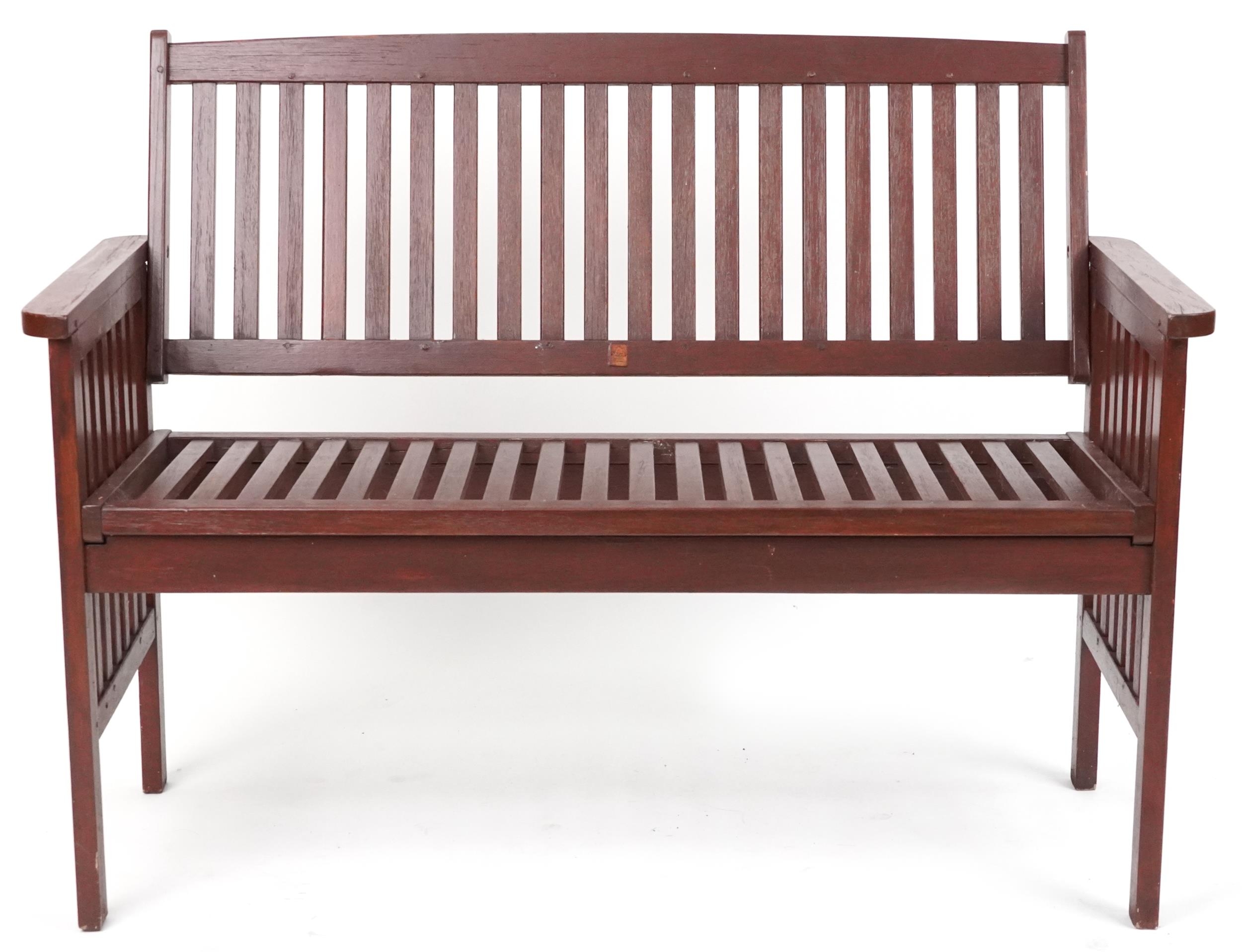Stained teak slatted garden bench, 89cm H x 118.5cm W x 58cm D - Image 2 of 5