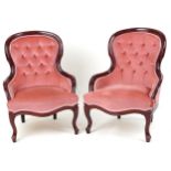 Pair of Victorian style mahogany bedroom chairs with salmon button back upholstery, each 82cm high