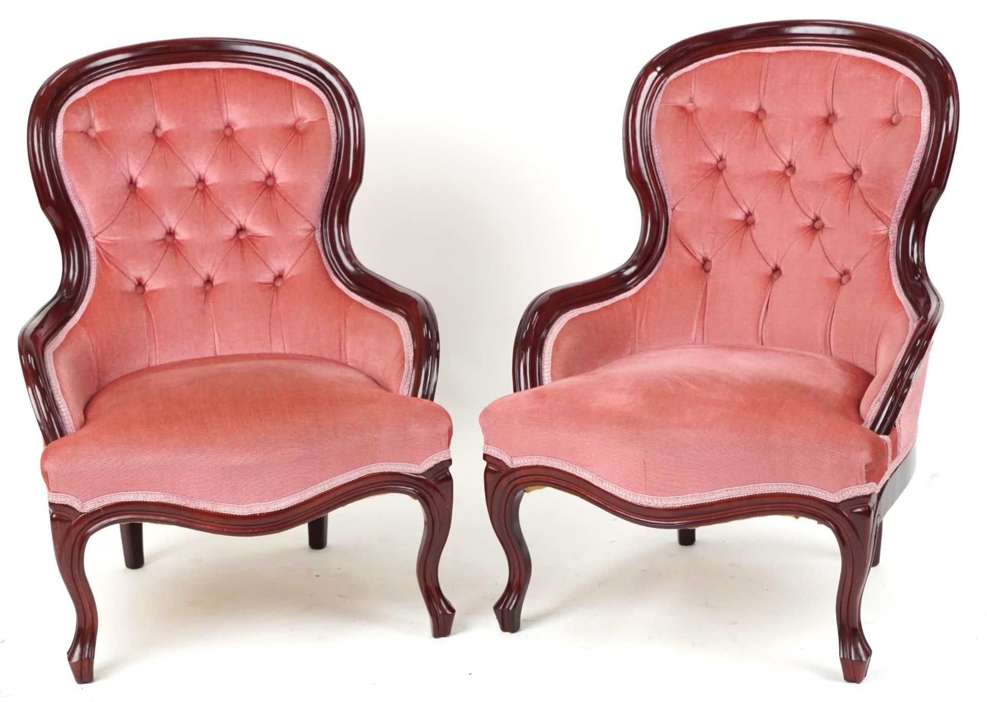 Pair of Victorian style mahogany bedroom chairs with salmon button back upholstery, each 82cm high