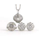 18ct white gold diamond jewellery suite set with round brilliant cut diamonds and baguette cut