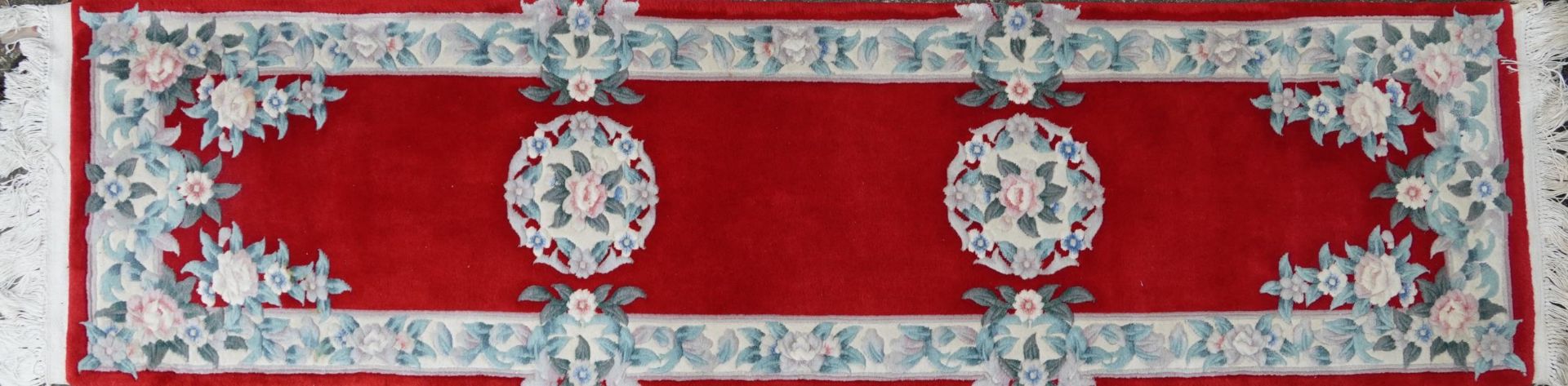 Three Chinese red ground floral rugs including a runner, the largest 255cm x 70cm - Image 10 of 13