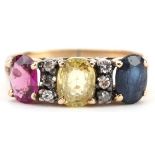 Continental gold multi gem ring set with six diamonds, ruby, sapphire and citrine, tests as 9ct