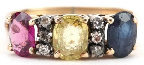 Continental gold multi gem ring set with six diamonds, ruby, sapphire and citrine, tests as 9ct