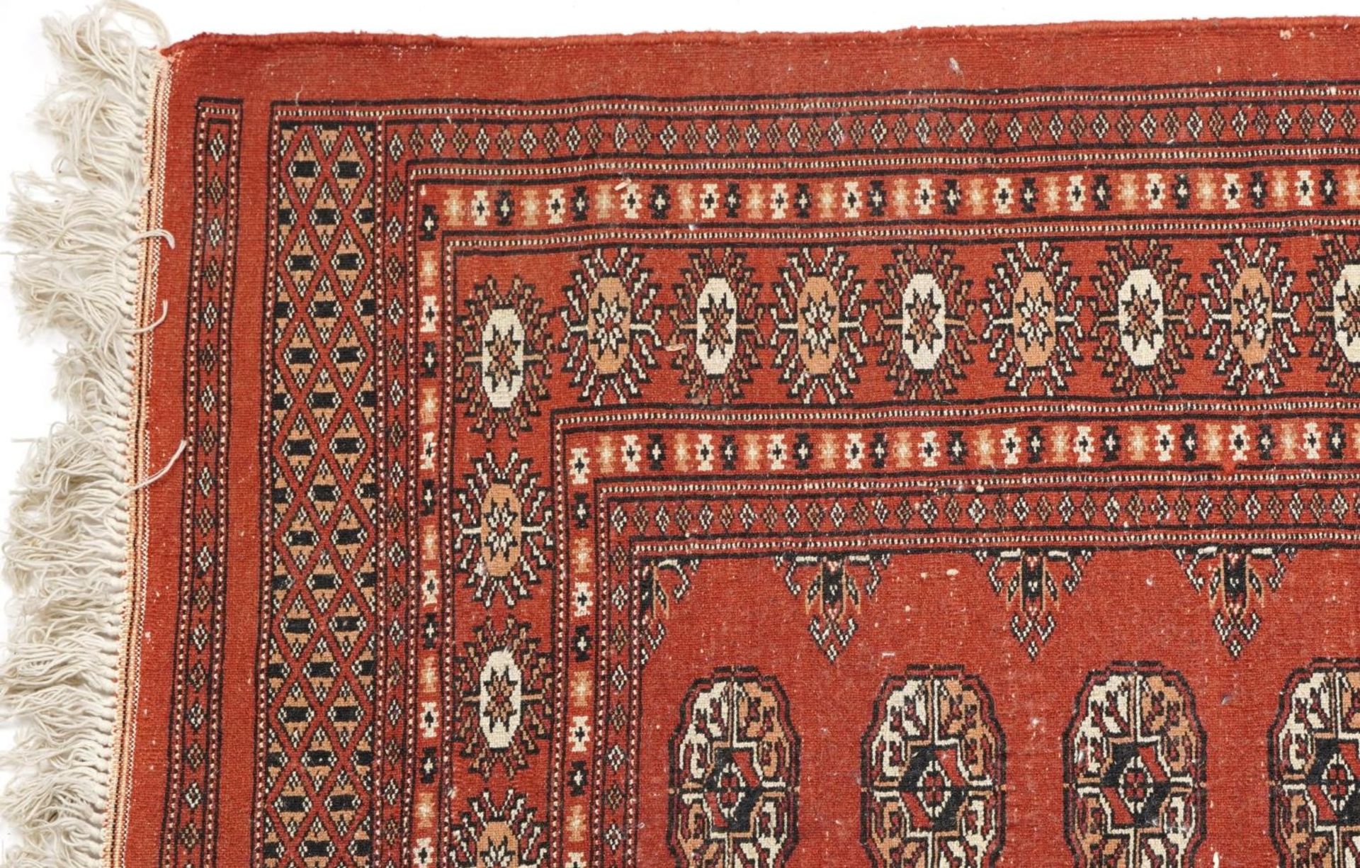 Rectangular Turkish Bokhara peach ground rug having an allover repeat flower head design, 150cm x - Bild 4 aus 4