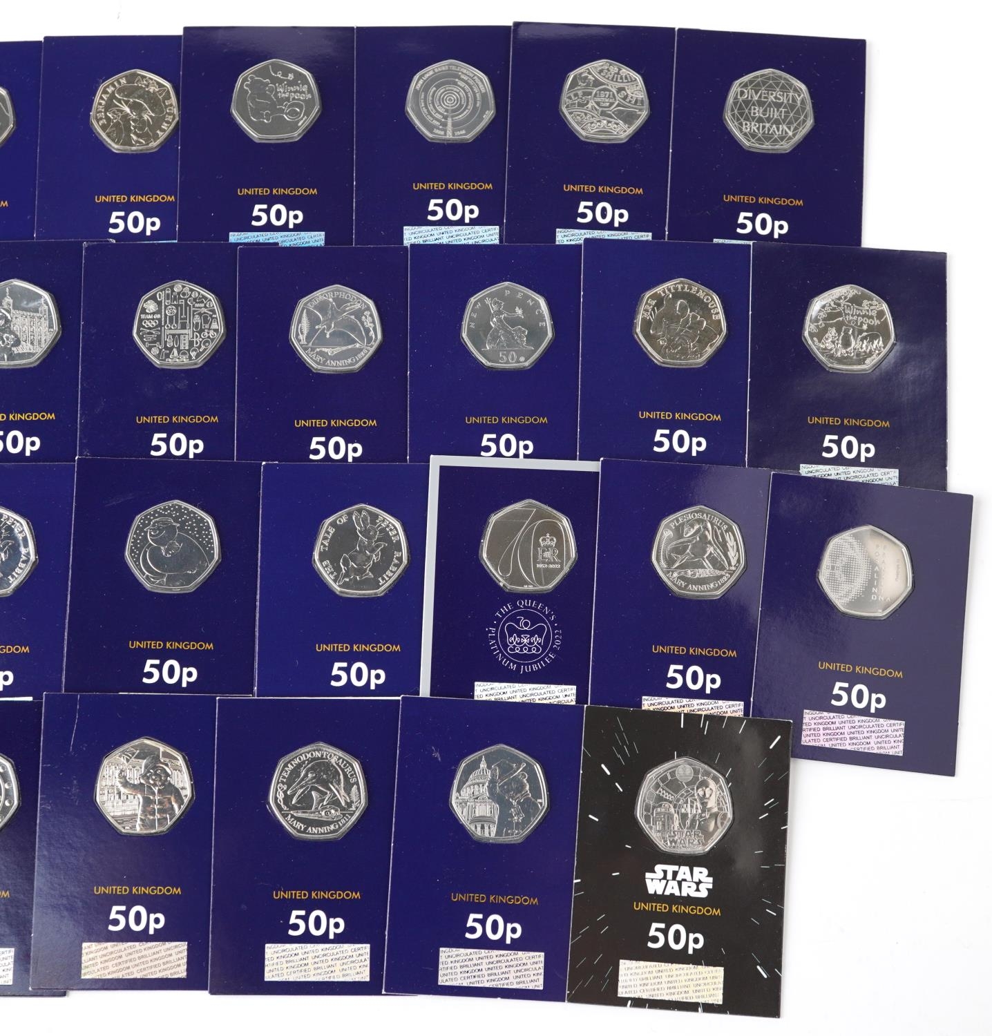 Thirty three Elizabeth II fifty pence pieces housed in Change Checker sleeves, various designs - Image 3 of 3