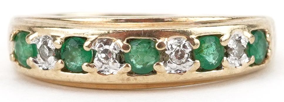 9ct gold diamond and emerald half eternity ring, indistinct marks to the band, size M/N, 2.1g