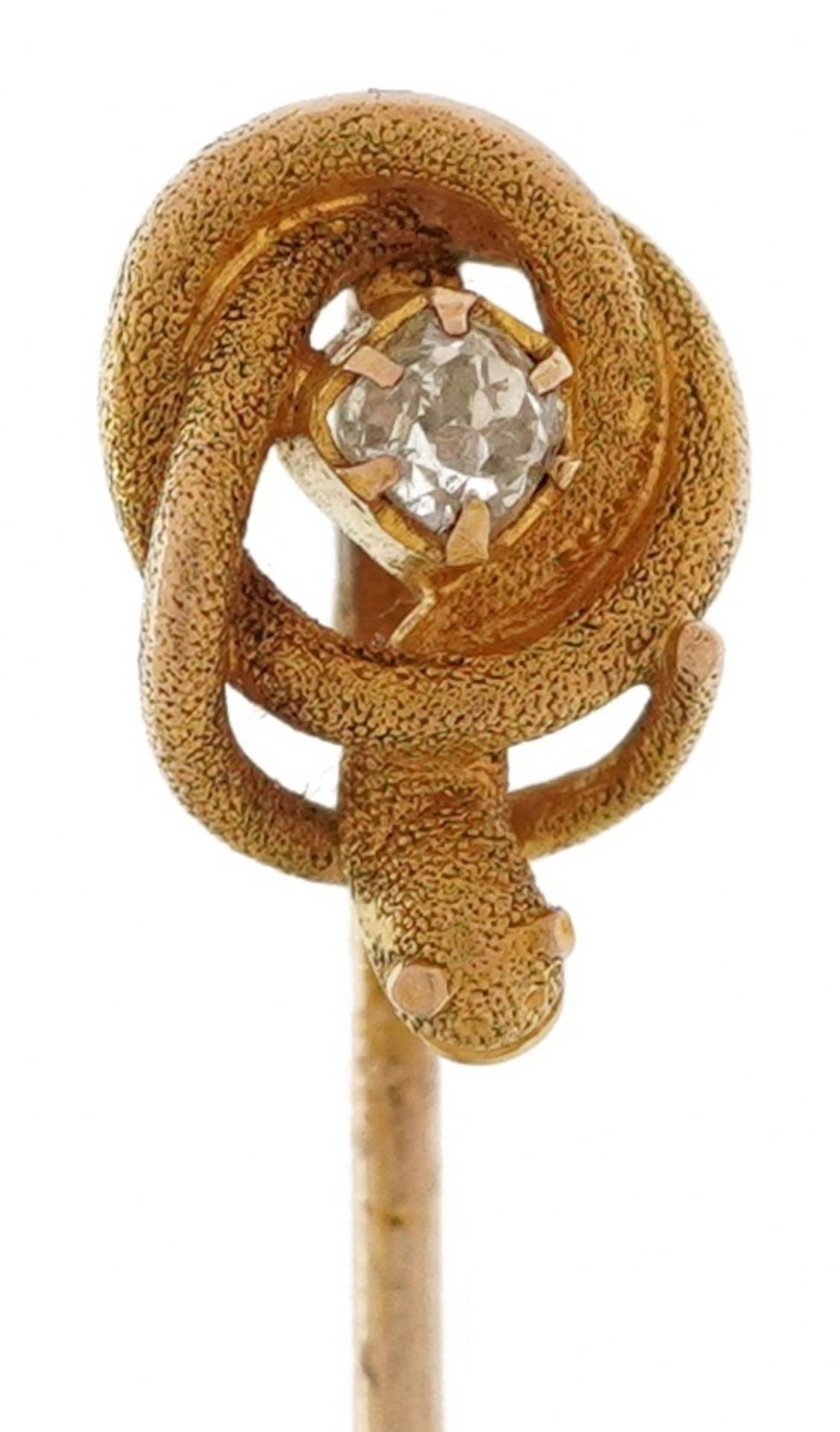 Unmarked gold and yellow metal diamond solitaire stickpin in the form of a serpent, the serpent