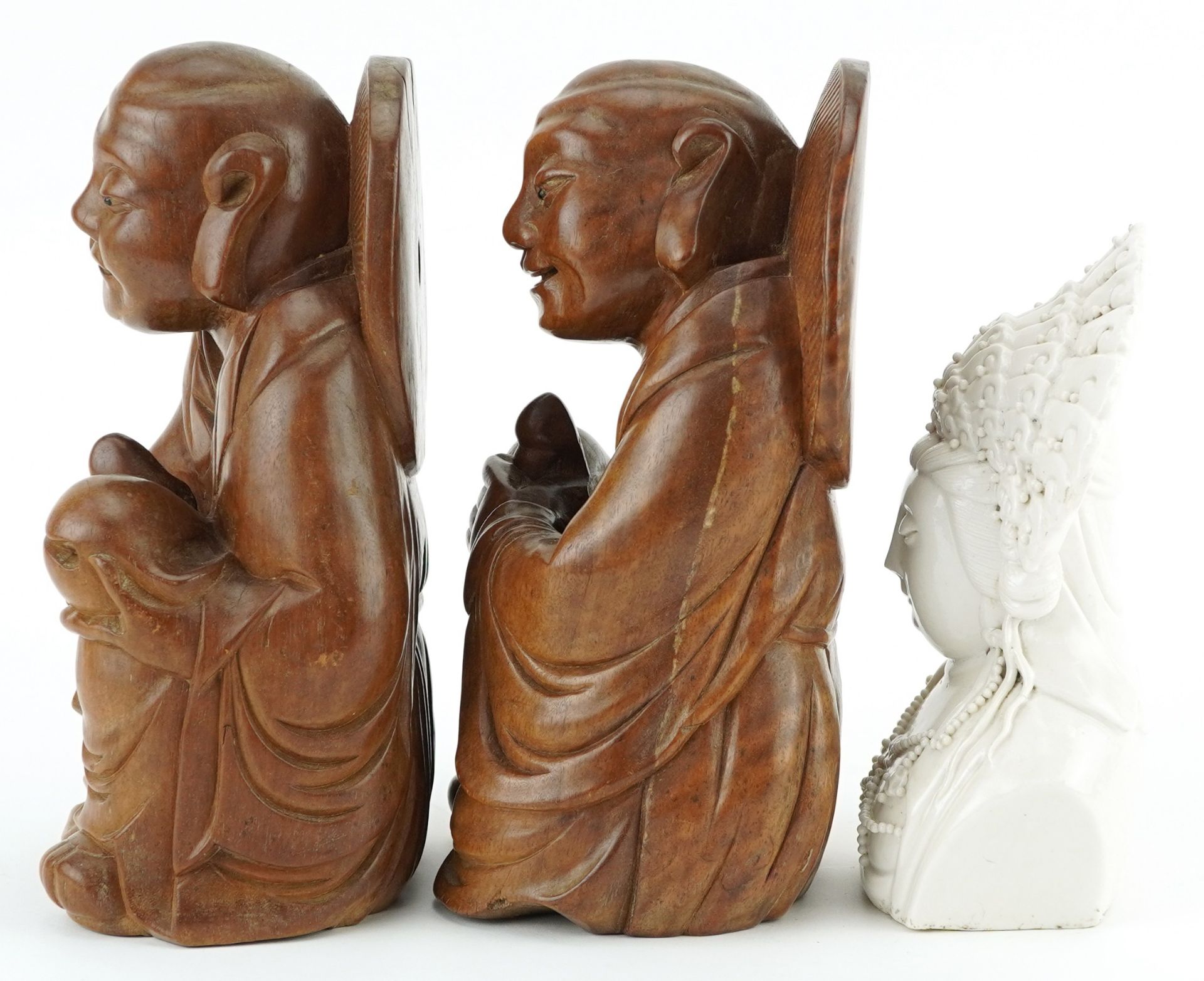 Pair of Chinese hardwood carvings of Buddha and blanc de chine glazed porcelain bust of Guanyin, the - Image 2 of 7