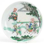 Chinese porcelain dish hand painted in the famille verte palette with an emperor and attendants in a