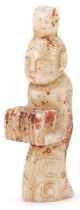 Chinese russet and white jade carving of a young female, 10.5cm high