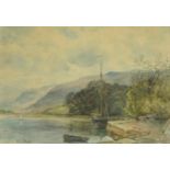 Philip Osment - River with moored boats before mountains, early 20th century watercolour, mounted,