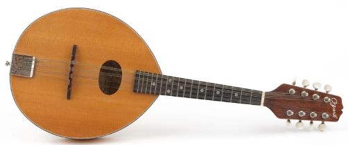 Ozark Professional eight string mandolin with paper label, 6.3cm in length