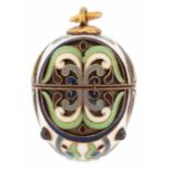 Silver gilt and enamel egg pendant set with garnet cabochons, impressed Russian marks to the