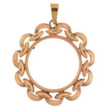 9ct gold sovereign pendant mount, 3.5cm in diameter, 2.6g