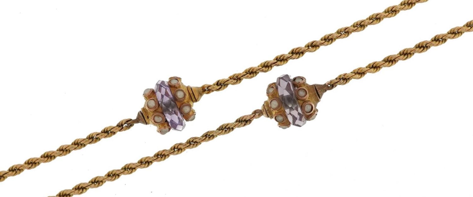 Unmarked gold amethyst and seed pearl rope twist necklace, tests as 9ct gold, 60cm in length, 7.7g