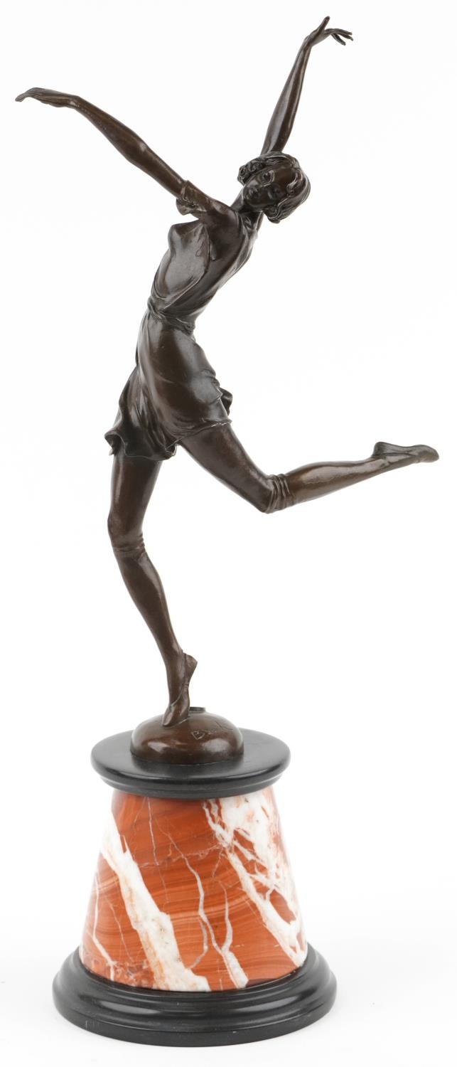After Bruno Zach, large patinated bronze statuette of an Art Deco female raised on a tapering marble