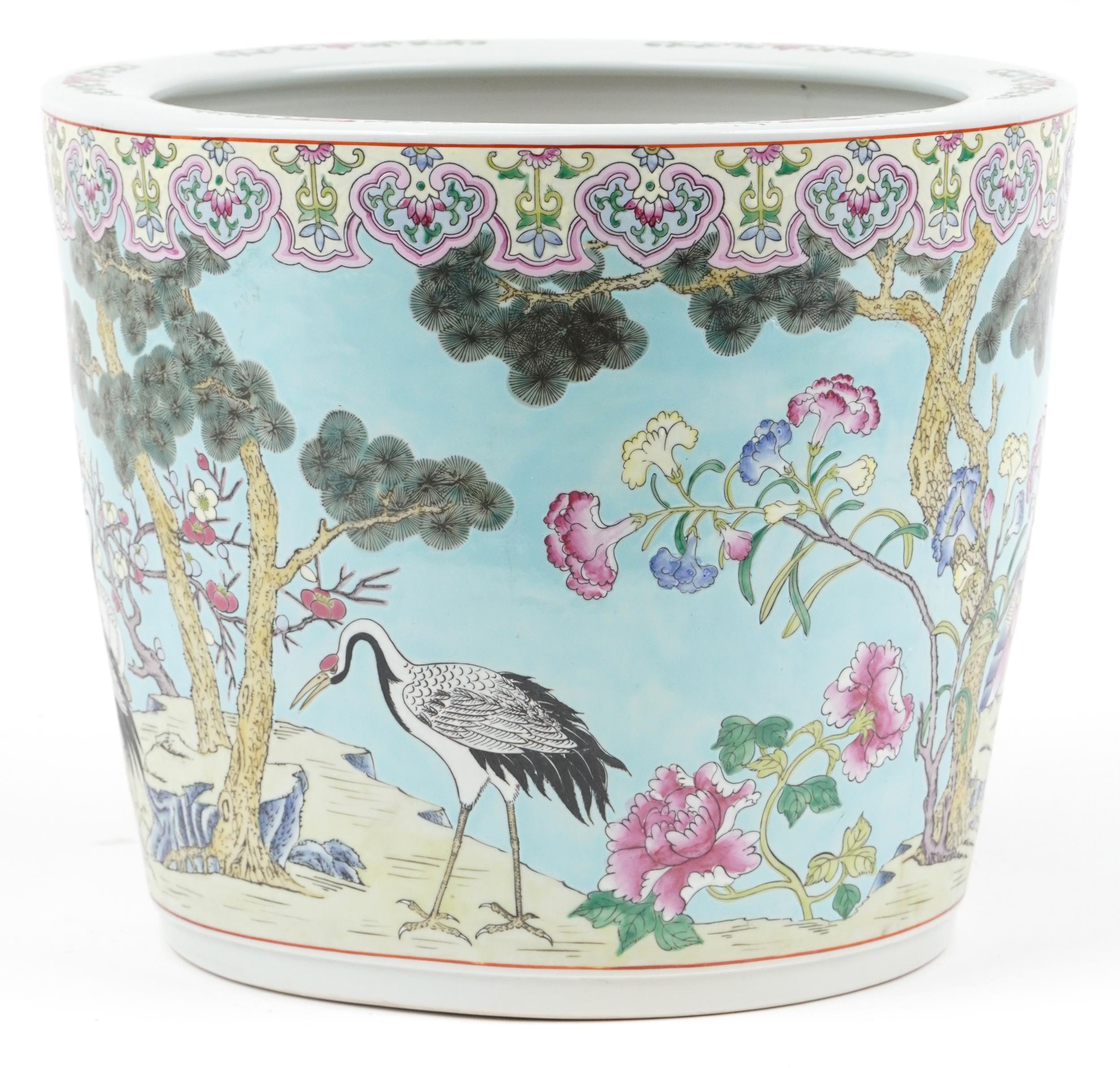 Large Chinese turquoise ground porcelain jardiniere hand painted in the famille rose palette with - Image 2 of 7