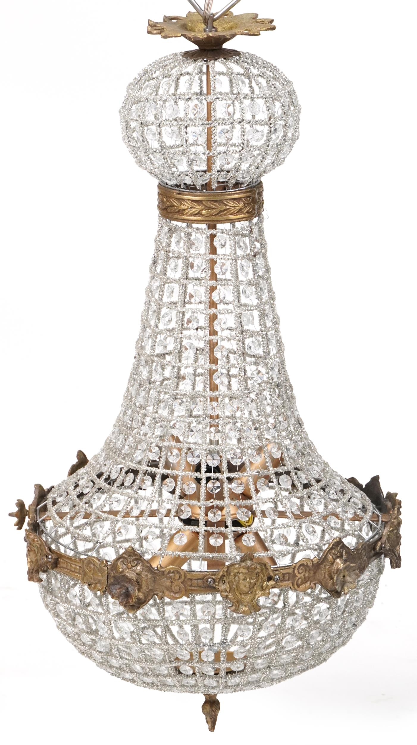 Ornate chandelier with brass mounts, 75cm high