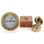 Shipping interest bulk head Sestrel wall barometer and a naval interest compass with hardwood
