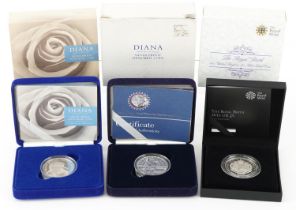 Three commemorative silver proof coins with fitted cases and certificates by The Royal Mint, two
