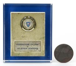 Sporting interest 1960 Olympic bronze medallion and a Italian Athletics Federation desk paperweight,