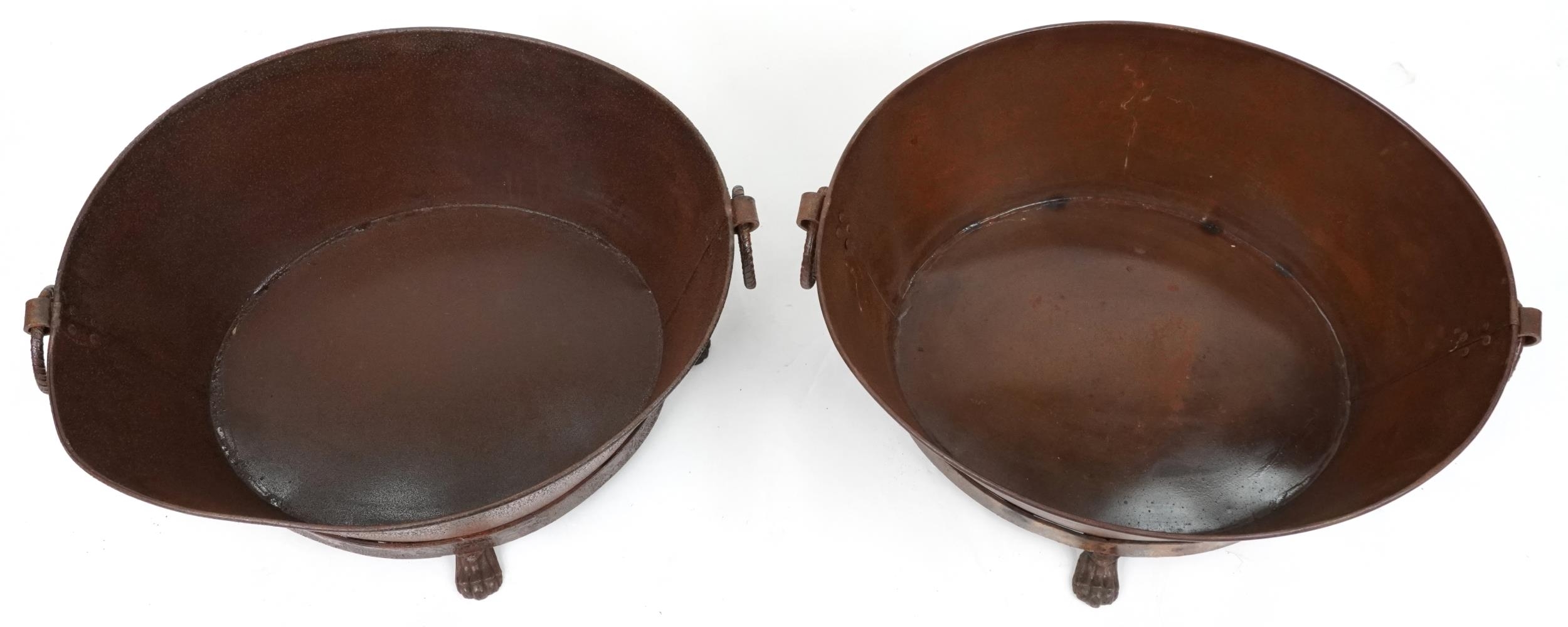 Pair of cast metal oval lock buckets with ring turned handles on paw feet, each 32cm H x 72cm W x - Image 2 of 3