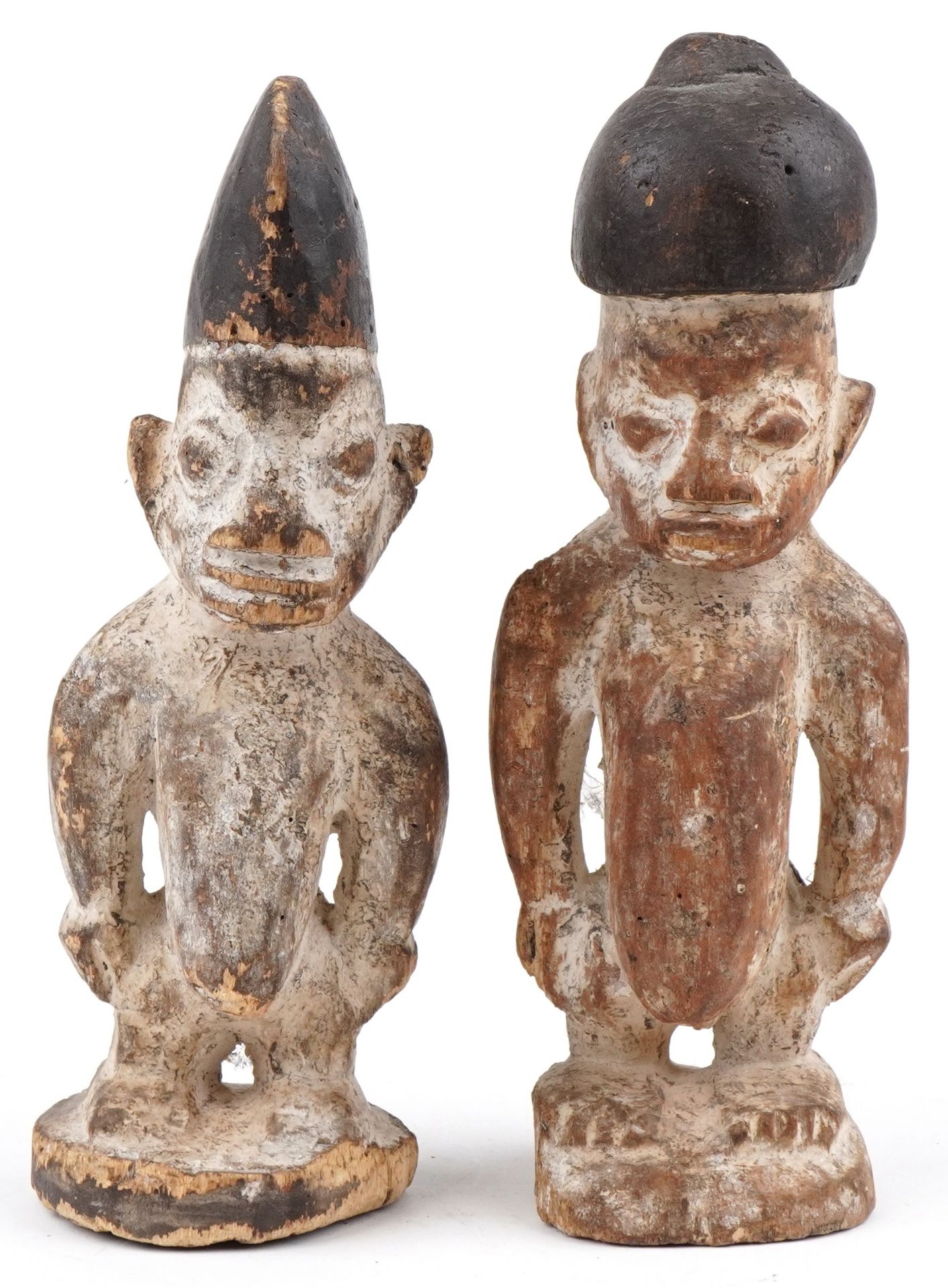 Pair of African tribal interest carved wood figures, the largest 30.5cm high