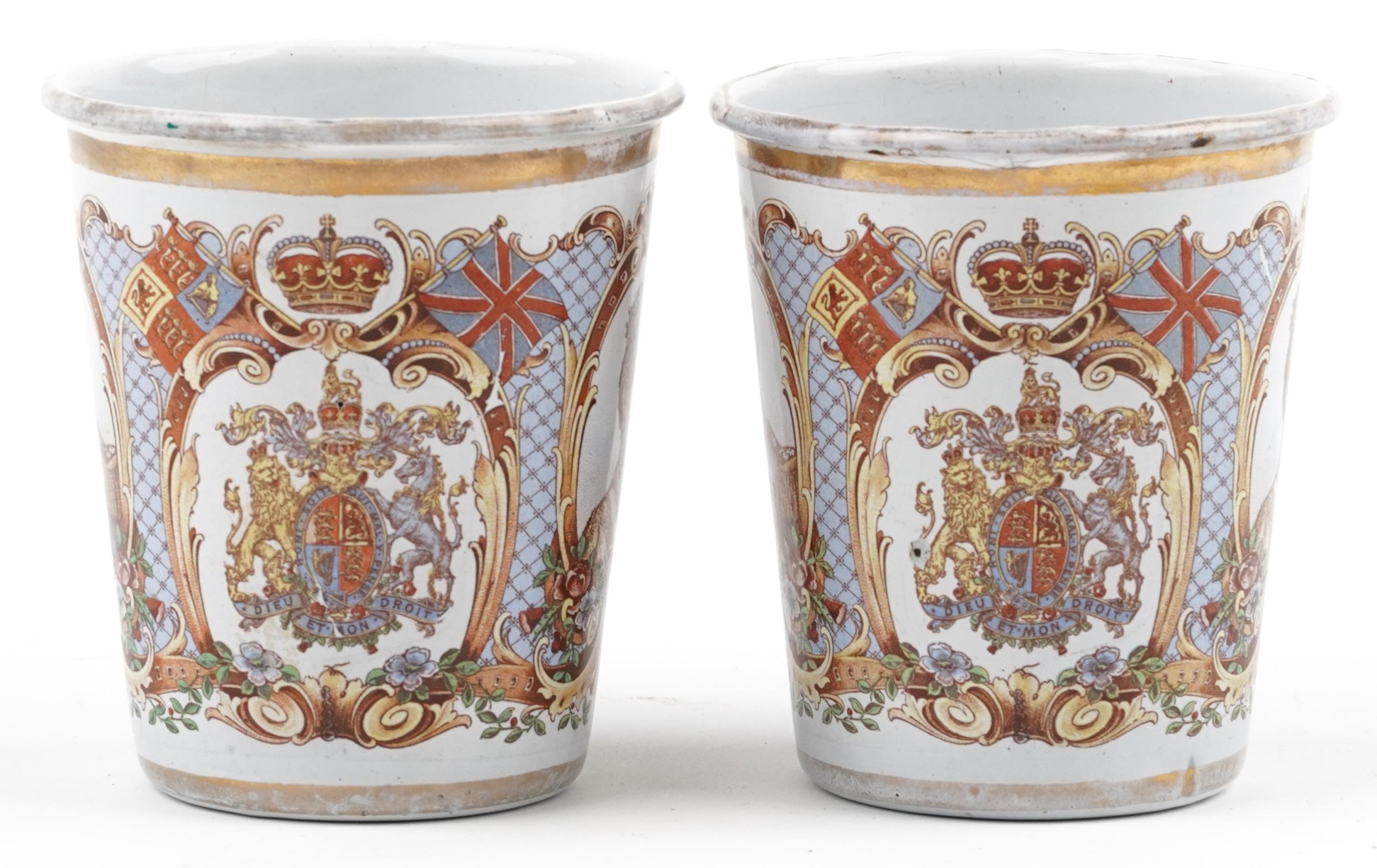 Pair of George V 1911 Coronation enamel beakers, each 10cm high