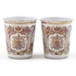 Pair of George V 1911 Coronation enamel beakers, each 10cm high