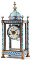 French champleve enamel and brass four glass mantle clock striking on a gong, the enamelled dial