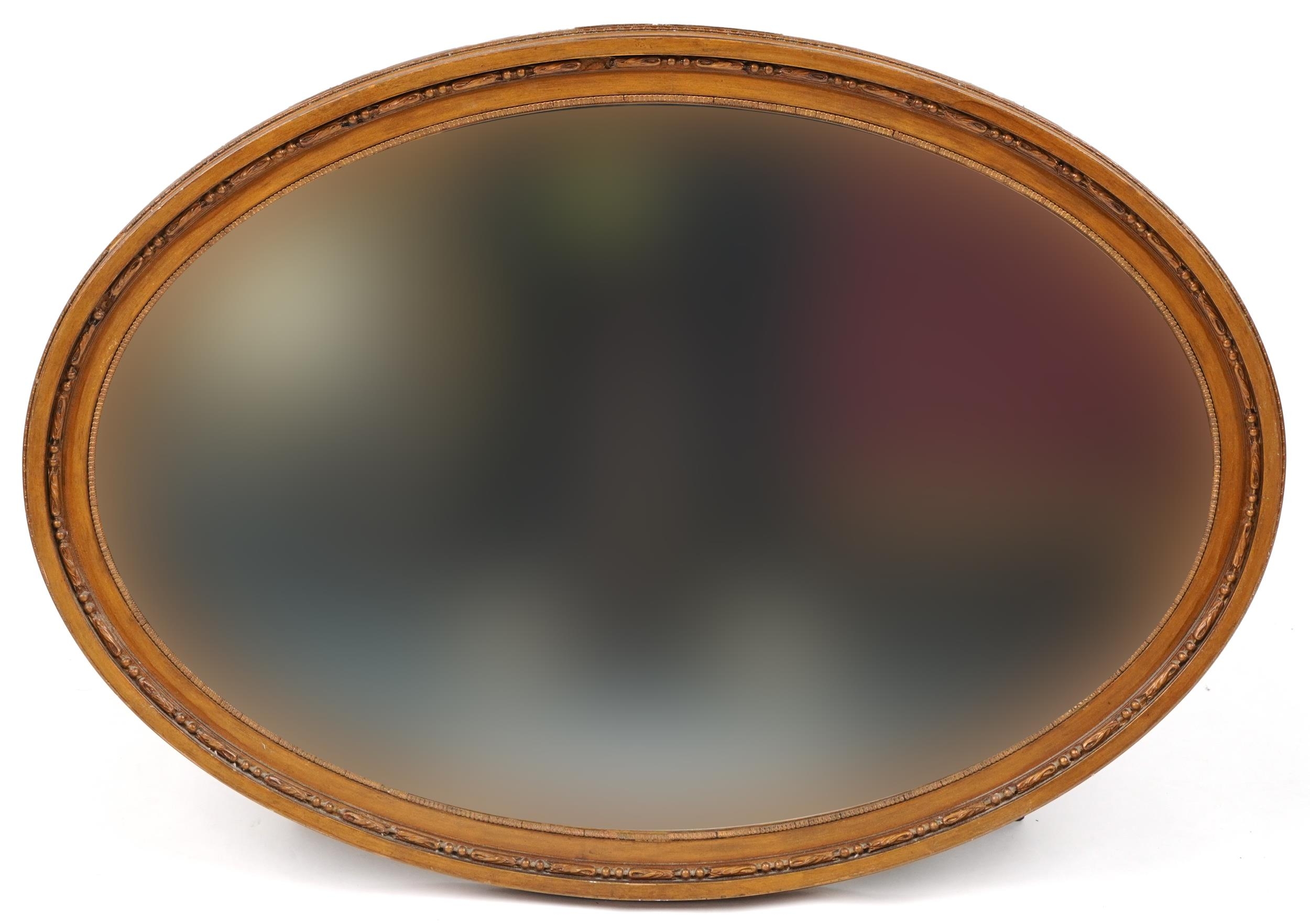 Two oval gilt framed wall mirrors with bevelled glass, the largest 93cm x 58cm - Image 2 of 5