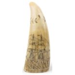 Antique sailor's scrimshaw whale's tooth engraved with whalers beside a rigged ship inscribed