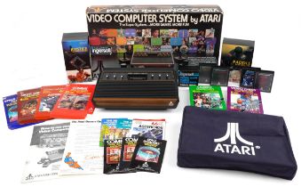 Vintage Atari video computer system with box model CX-2600
