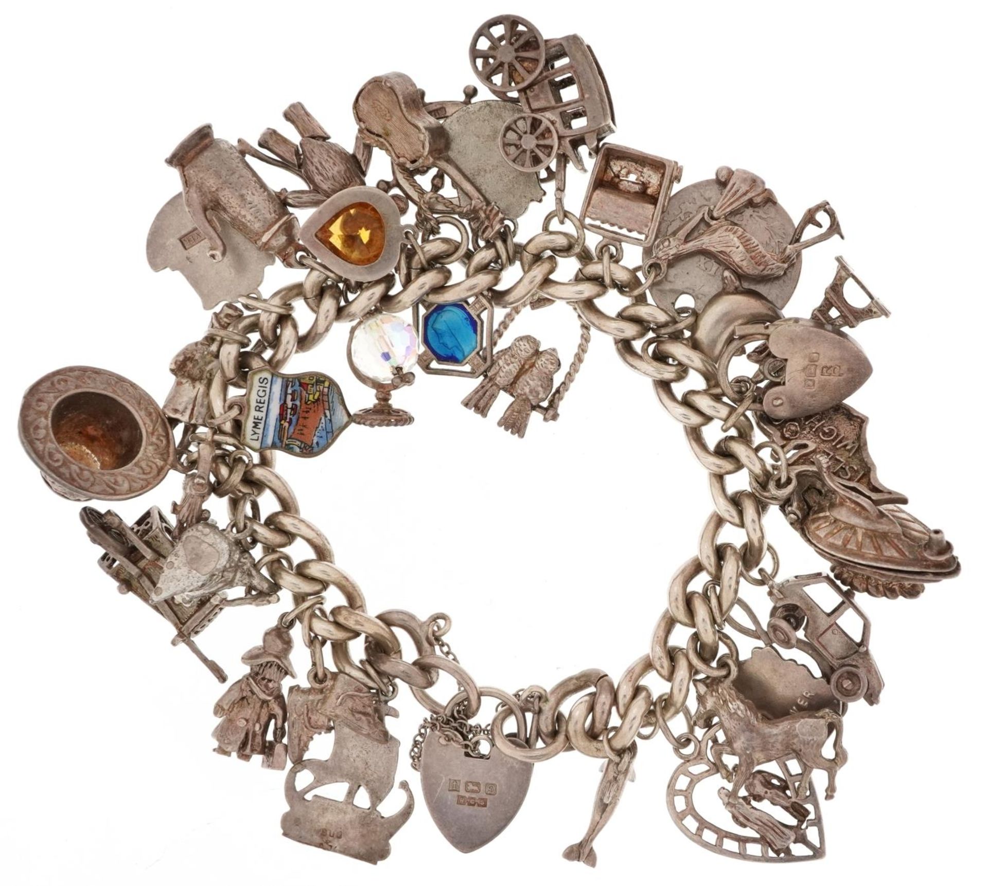 Silver charm bracelet with a large collection of mostly silver charms and love heart padlock, - Bild 2 aus 3