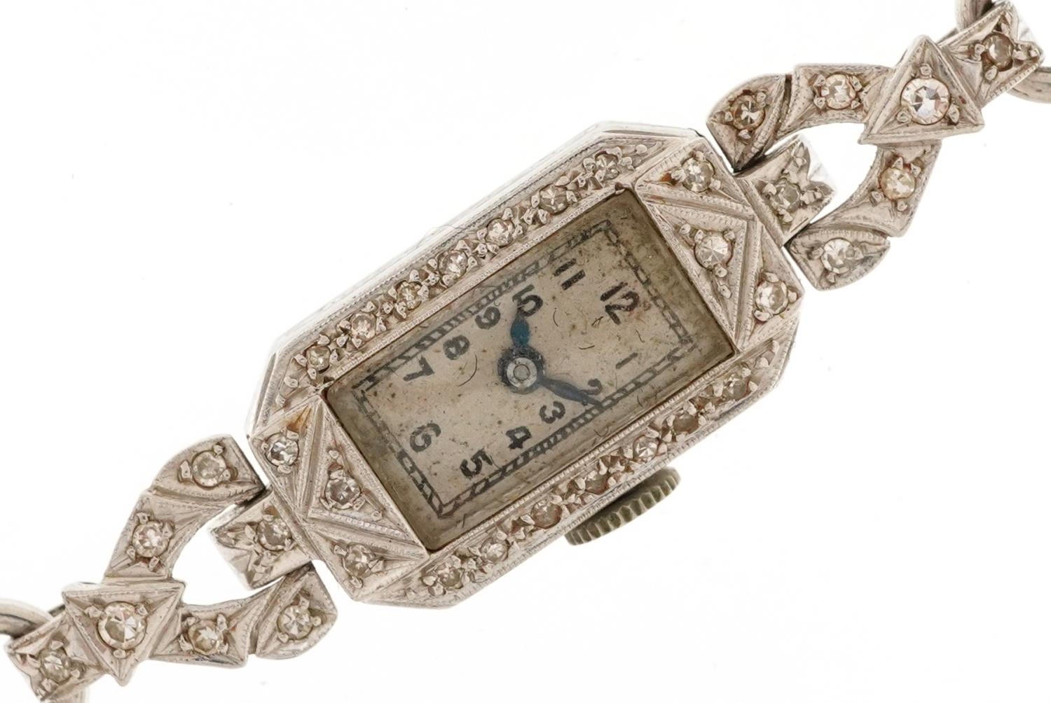 Art Deco ladies platinum diamond manual wind cocktail watch on a 9ct white gold strap having