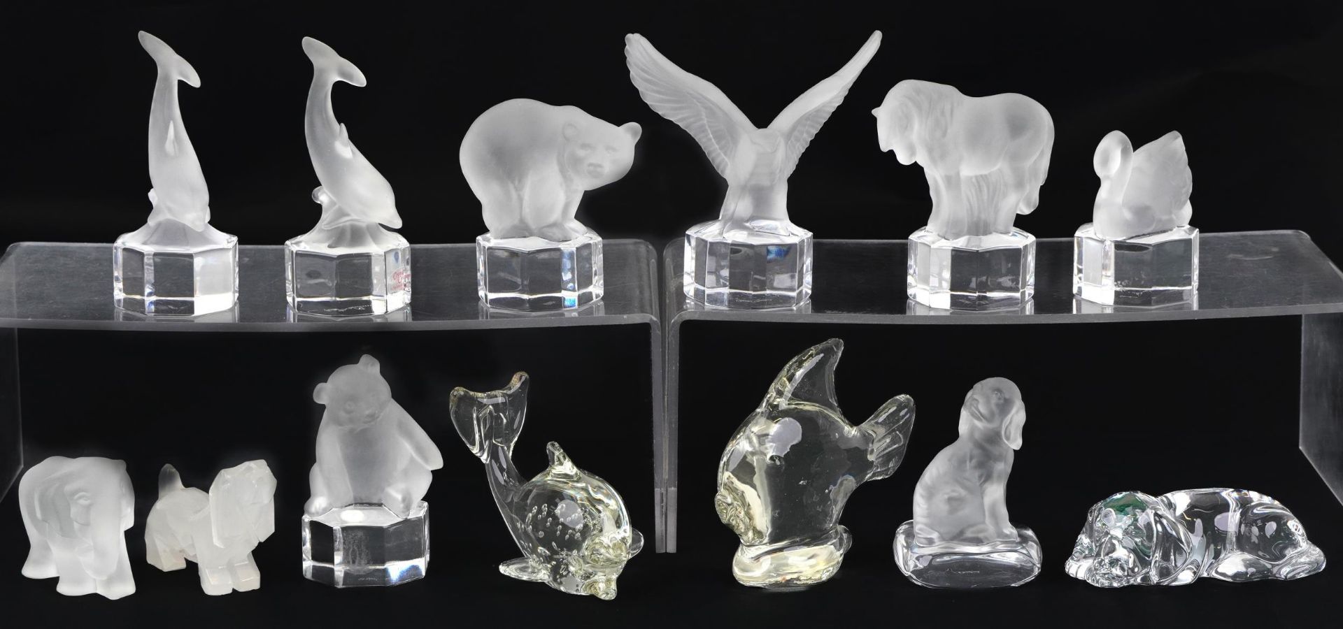 Thirteen frosted, clear glass and stone animal paperweights including Goebel examples, the largest