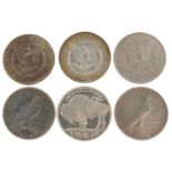 Six 19th century and later United States of America silver dollars including dates 1884, 1886,