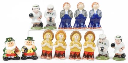 Thirteen novelty porcelain figural casters including seven Wade examples, the largest 12cm high