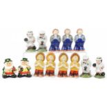 Thirteen novelty porcelain figural casters including seven Wade examples, the largest 12cm high