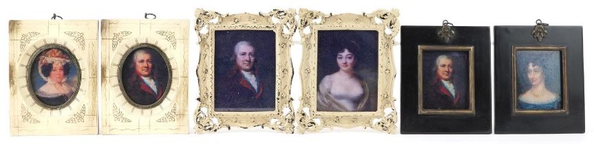 Three pairs of portrait miniatures including a pair housed in ebonised frames, the largest overall